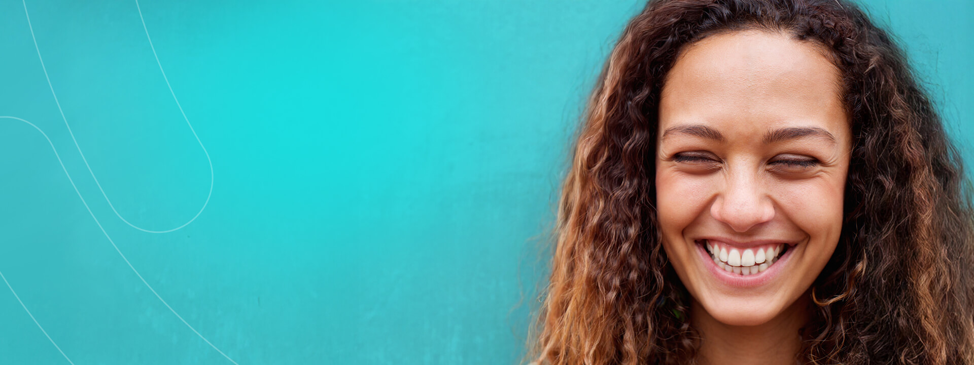 Person smiling broadly